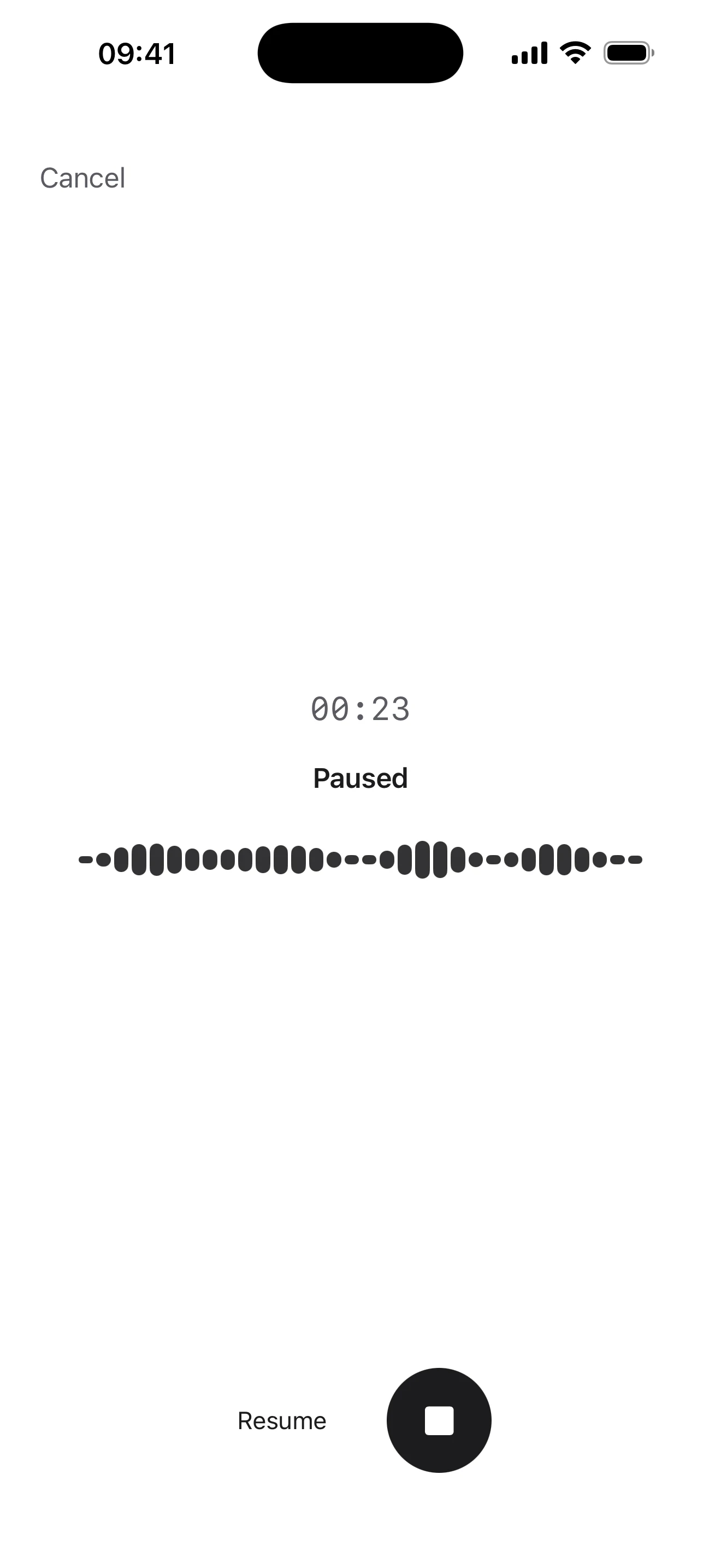 The same As Told recording held at 00:23 and marked Paused, with Cancel above and Resume beside a round stop button. Nothing on the screen asks which language is being spoken.